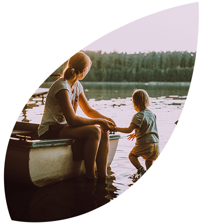 Report4 A mother and son enjoying an evening at a lake.