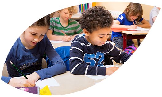 Education Children doing a classroom assignment.