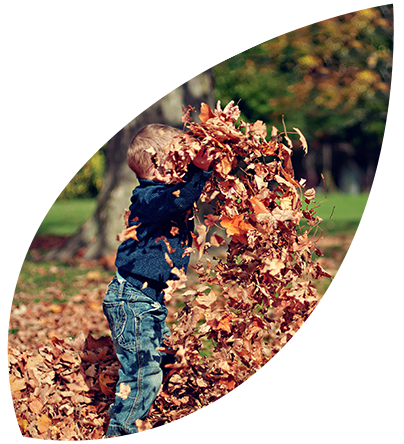 MentalHealth3 A boy playing with leaves