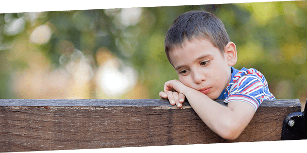 Sad Boy on park bench